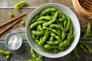 An image of raw, green Edamame Soy Beans.